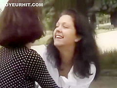 Two girls making out in public