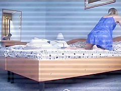 Uninhibited blonde takes her clothes off and goes to bed in