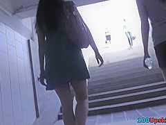 Upskirt footage of g-string of a girl in a-line skirt