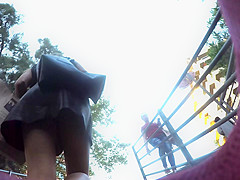 Upskirt in the stairs of aleather skirt