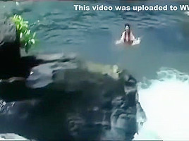 Wet Hot Indian Actress getting wet in sexy clothes in river