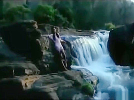 Wet Hot Indian Actress getting wet in sexy clothes in river
