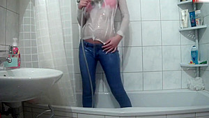 Wetlook pissing and showering jeans