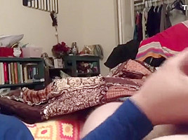 Wife giving hand job while reading 
