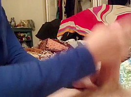 Wife giving hand job while reading 