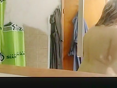 Wife spied in bathroom through the window