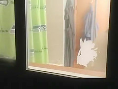 Wife spied in bathroom through the window