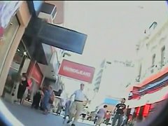 Window shopping babes chased by an upskirt