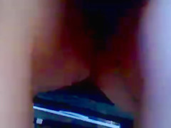 With his hand almost under her skirt 