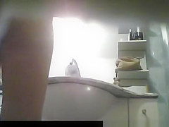 Woman caught by bathroom