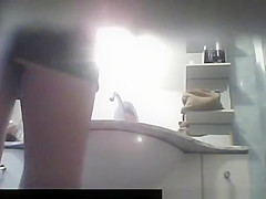 Woman caught by bathroom