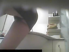 Woman caught by bathroom