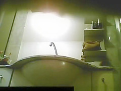Woman caught by bathroom