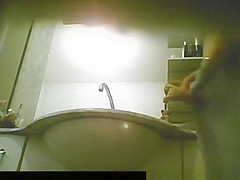Woman caught by bathroom