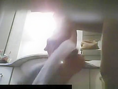 Woman caught by bathroom