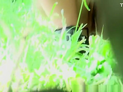 Woman spied through the bushes peeing