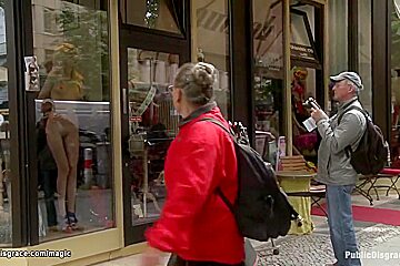 Zenza Raggi - Slave Posing Naked In Public Window