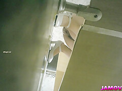 asian girl pissing in toilet