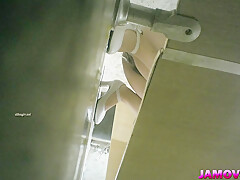 asian girl pissing in toilet