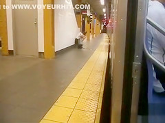 coed relieves herself at a metro station