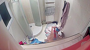 college girl in bathroom shower 1 of 4