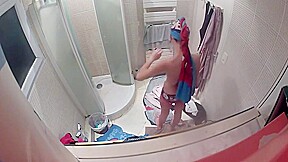college girl in bathroom shower 1 of 4