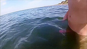 watch me with my big dick at the beach striping and in the water