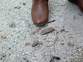 woman crush bugs boots