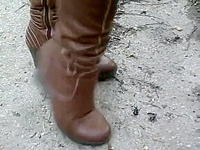woman crush bugs boots