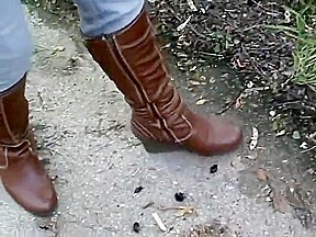 woman crush bugs boots
