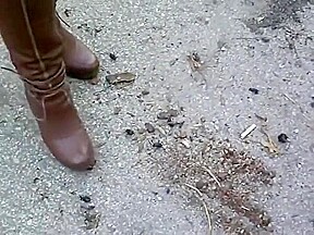 woman crush bugs boots
