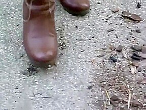 woman crush bugs boots